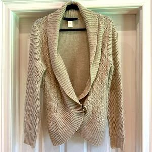 Soft and cozy cardigan with beautiful accent button.